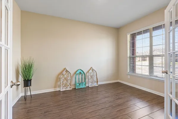 a view of a livingroom with wooden floor