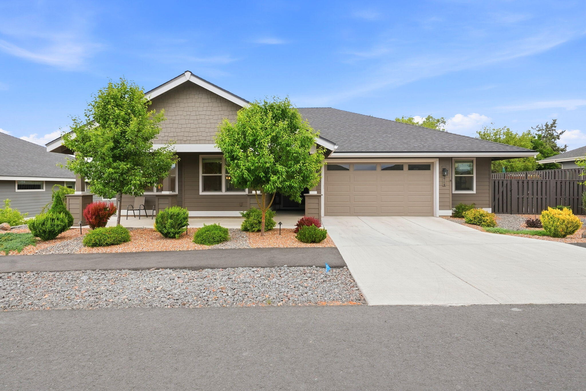 2714 Northwest 23rd Street Redmond, OR 97756 - Photo 1 of 57 front view of a house with a small yard