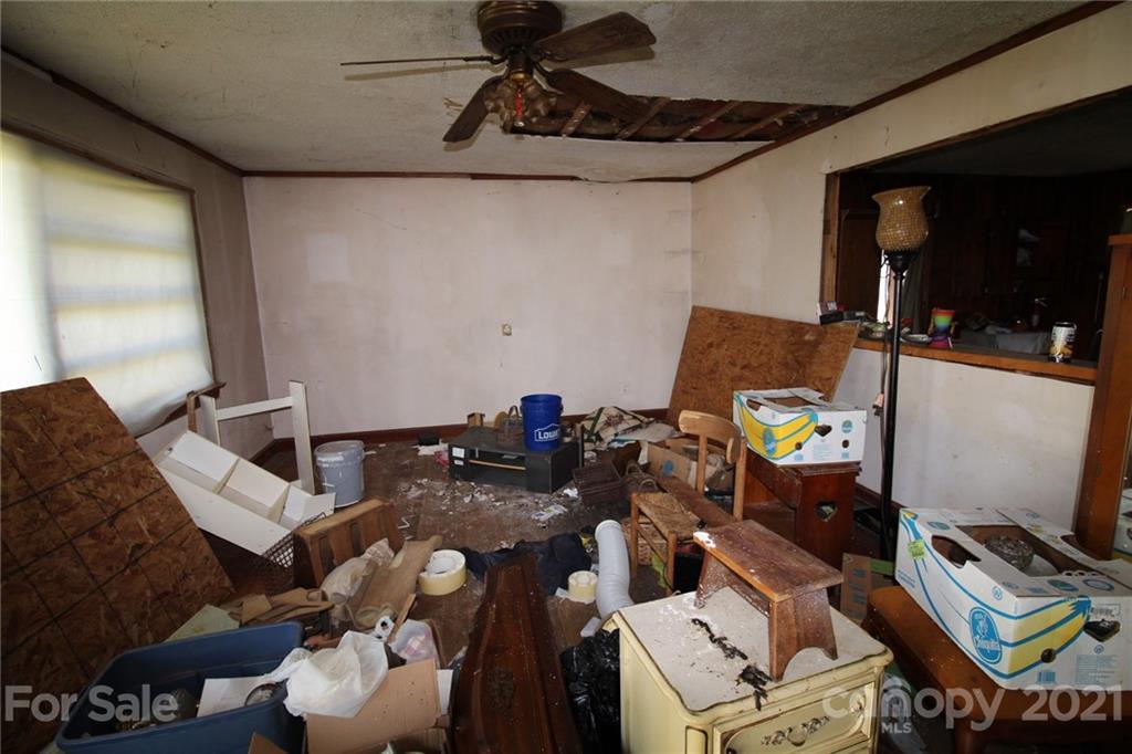 118 Furr Road, Unit 1 80 Cleveland, NC 27013 - Photo 5 of 26 a living room with furniture and a flat screen tv