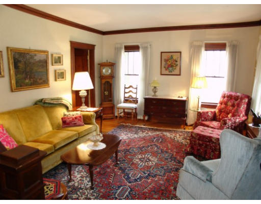 63 Spring Street Lexington, MA 02421 - Photo 4 of 14 a living room with furniture a window and a lamp