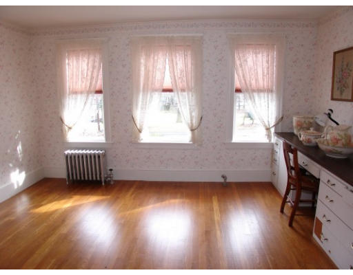 63 Spring Street Lexington, MA 02421 - Photo 10 of 14 a view of a room with wooden floor and windows