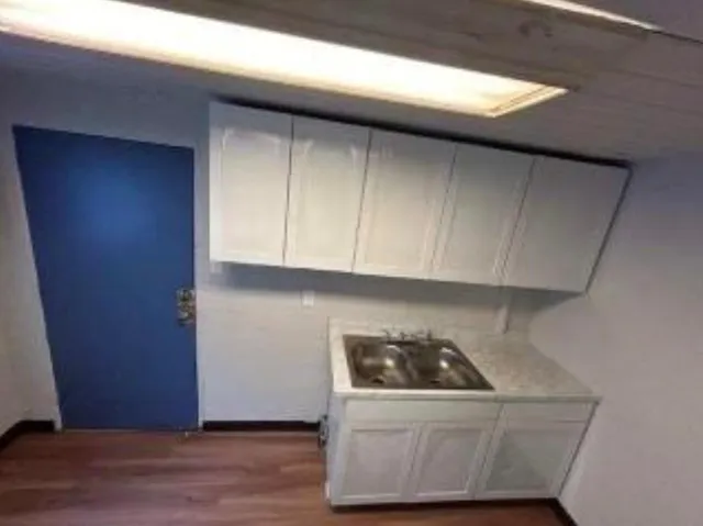 a utility room with washer and dryer