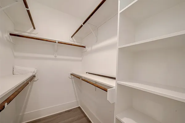 a view of an empty walk in closet