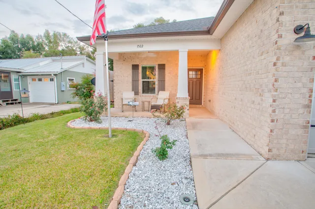 a front view of a house with swimming pool