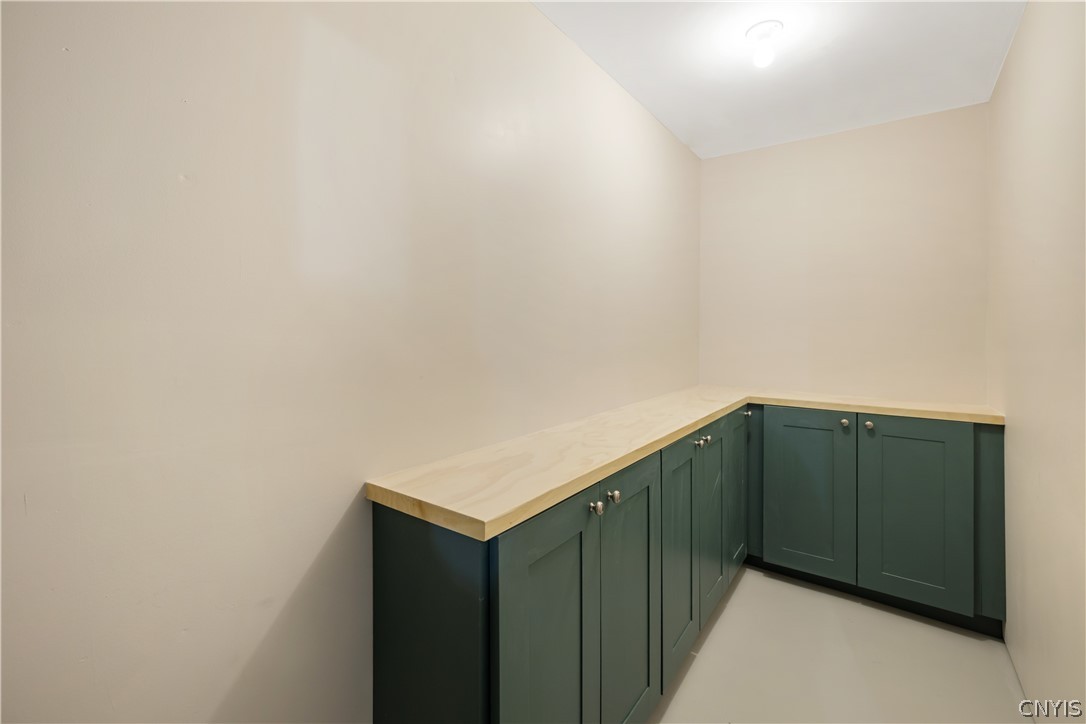 2780 Lyons Road Camillus, NY 13031 - Photo 44 of 46 Basement finished storage room and cabinets