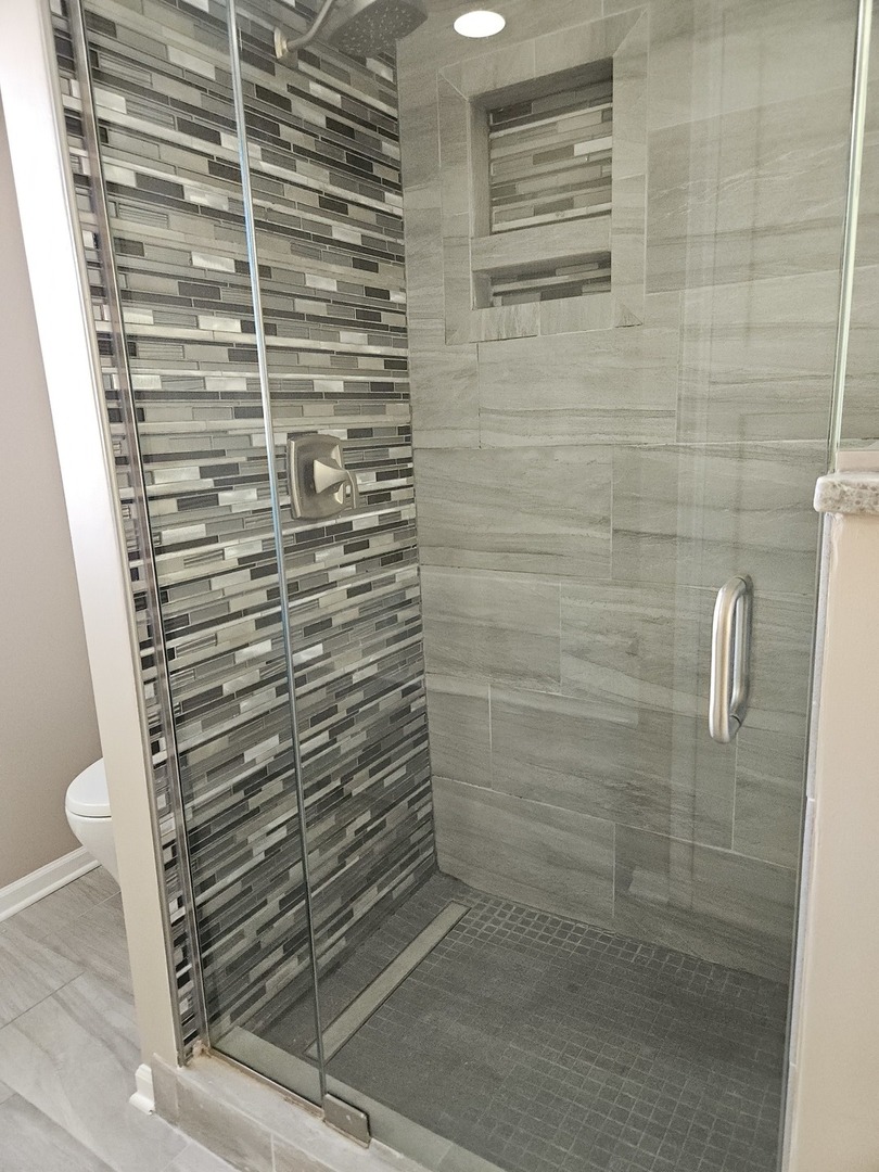 2011 Maplewood Circle Naperville, IL 60563 - Photo 13 of 43 a bathroom with a shower