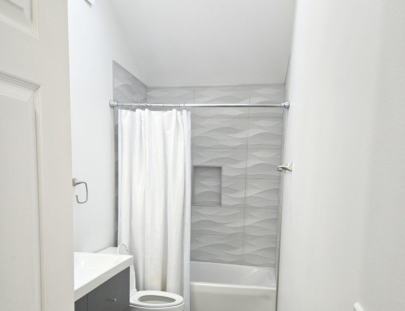 2011 Maplewood Circle Naperville, IL 60563 - Photo 22 of 43 a bathroom with a shower and a bath tub