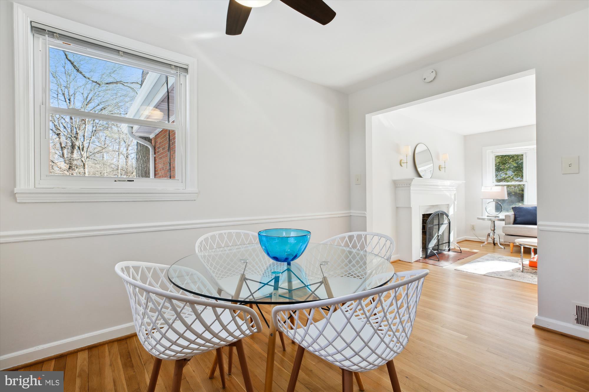 401 Greenbrier Drive Silver Spring, MD 20910 - Photo 13 of 57 a view of a dining room with furniture window and wooden floor
