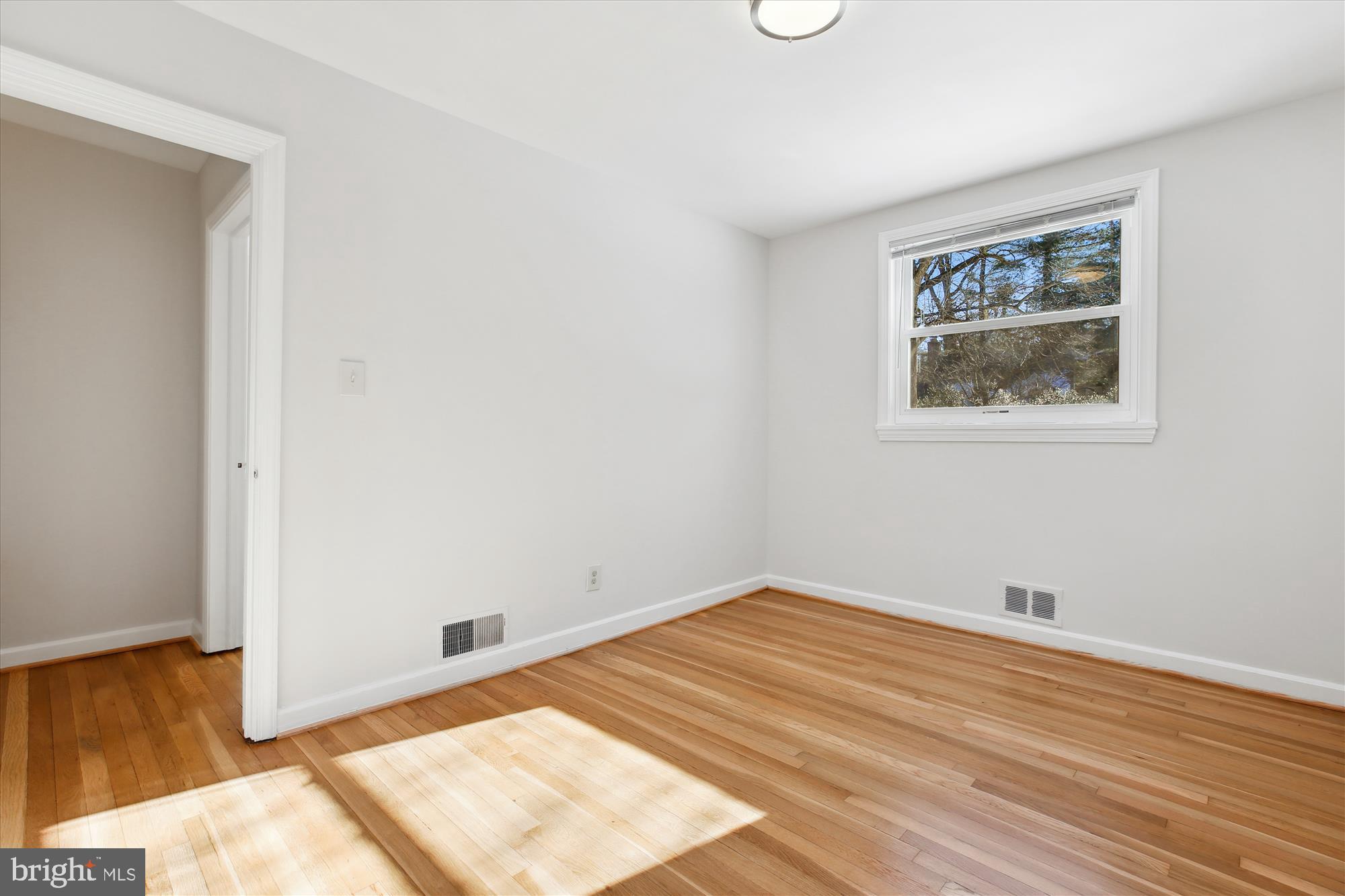 401 Greenbrier Drive Silver Spring, MD 20910 - Photo 26 of 57 a view of a room with wooden floor and small space