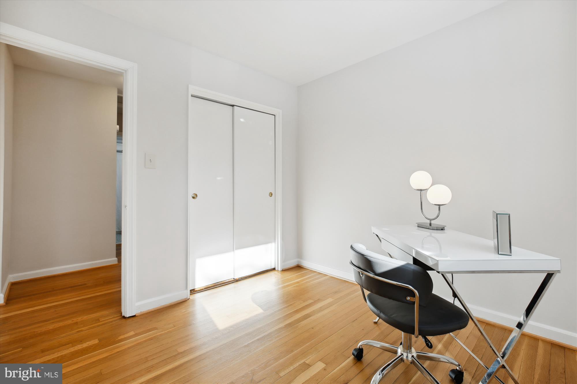 401 Greenbrier Drive Silver Spring, MD 20910 - Photo 28 of 57 a view of a workspace with wooden floor