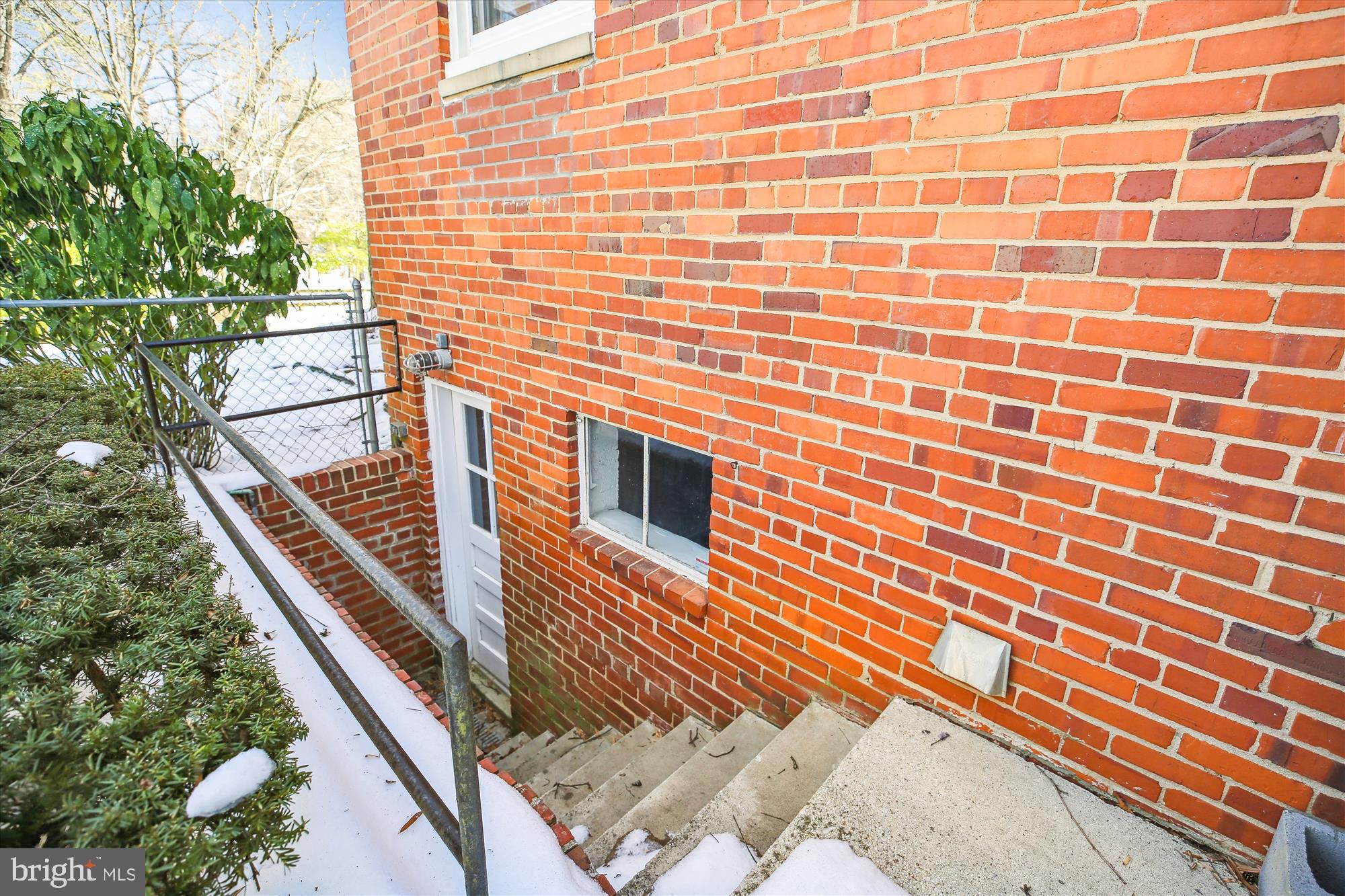 401 Greenbrier Drive Silver Spring, MD 20910 - Photo 44 of 57 a view of a balcony with a floor to ceiling window