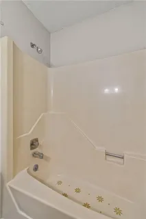 a bathroom with a bathtub