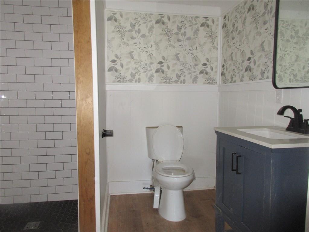 174 Adamson Road Marianna, PA 15345 - Photo 14 of 28 a bathroom with a toilet and a sink