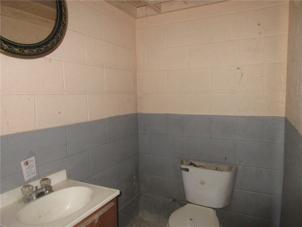 174 Adamson Road Marianna, PA 15345 - Photo 20 of 28 a bathroom with a toilet and a sink
