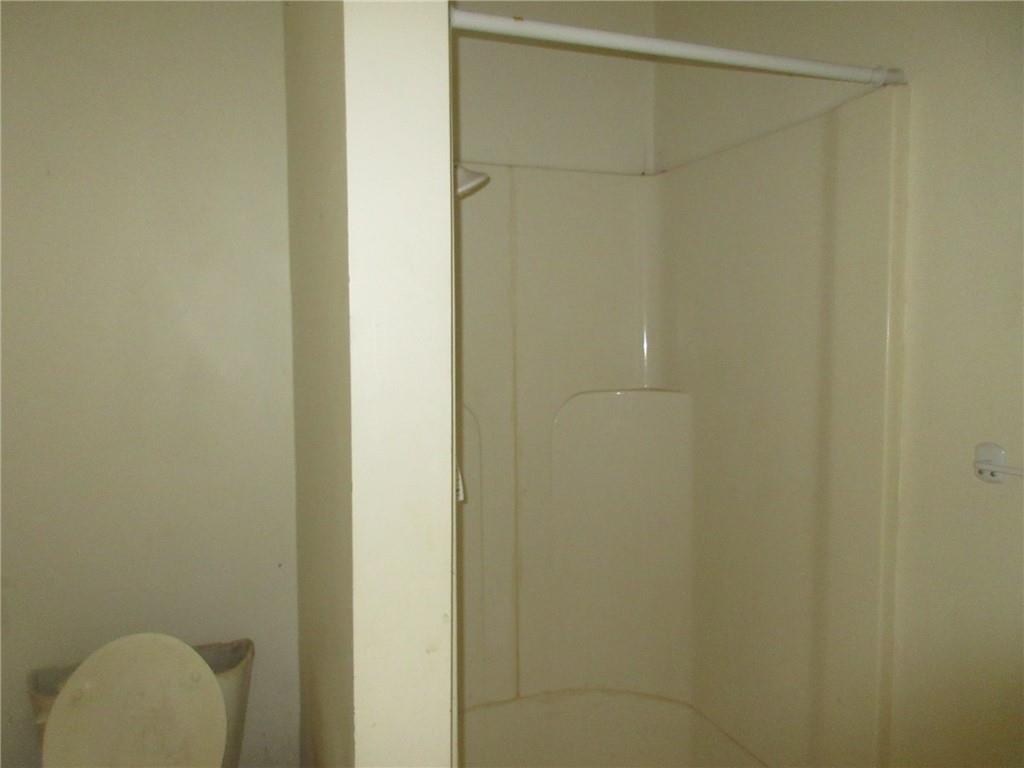 174 Adamson Road Marianna, PA 15345 - Photo 22 of 28 a bathroom with a shower curtain