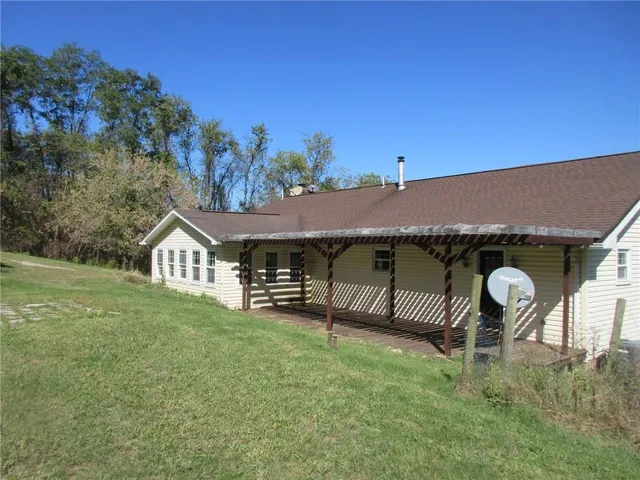 a house view with a garden space
