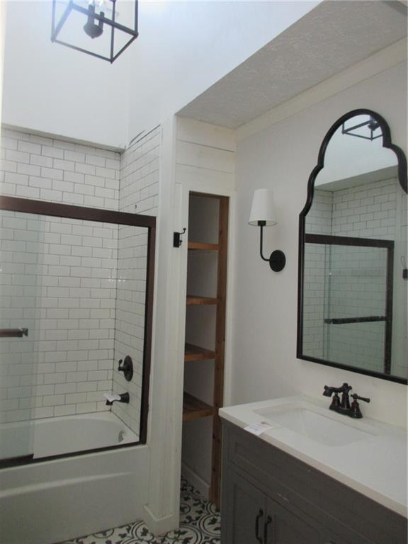 174 Adamson Road Marianna, PA 15345 - Photo 6 of 28 a bathroom with a sink a mirror and shower