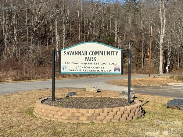a sign on the side of a road