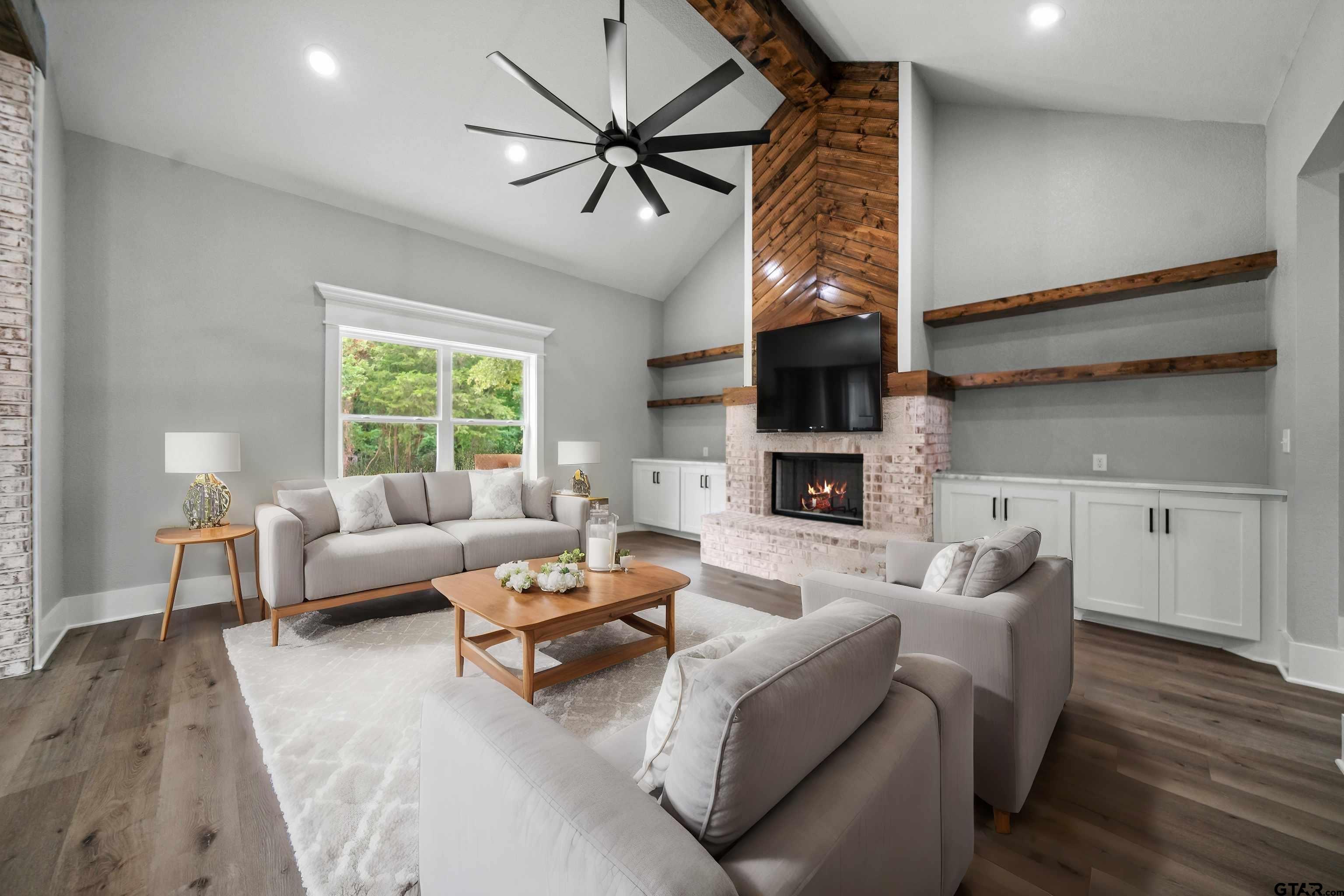 14552 Fallow Lane Tyler, TX 75706 - Photo 12 of 38 a living room with furniture and a window