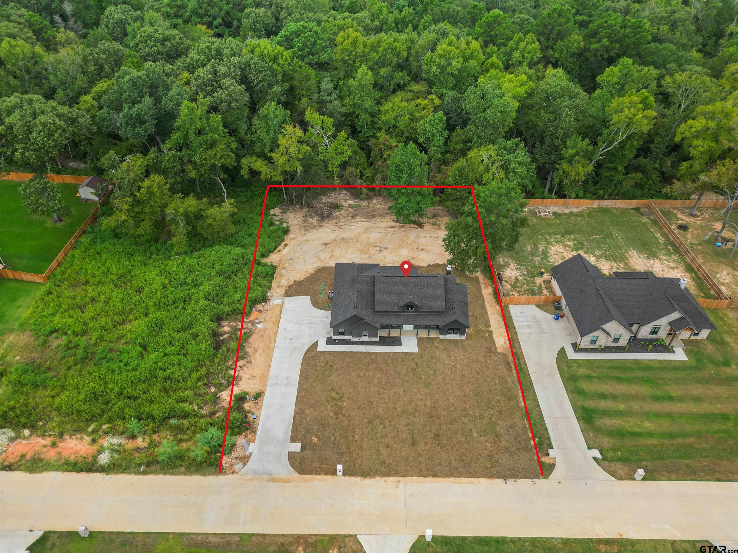 14552 Fallow Lane Tyler, TX 75706 - Photo 4 of 38 an aerial view of a house with outdoor space