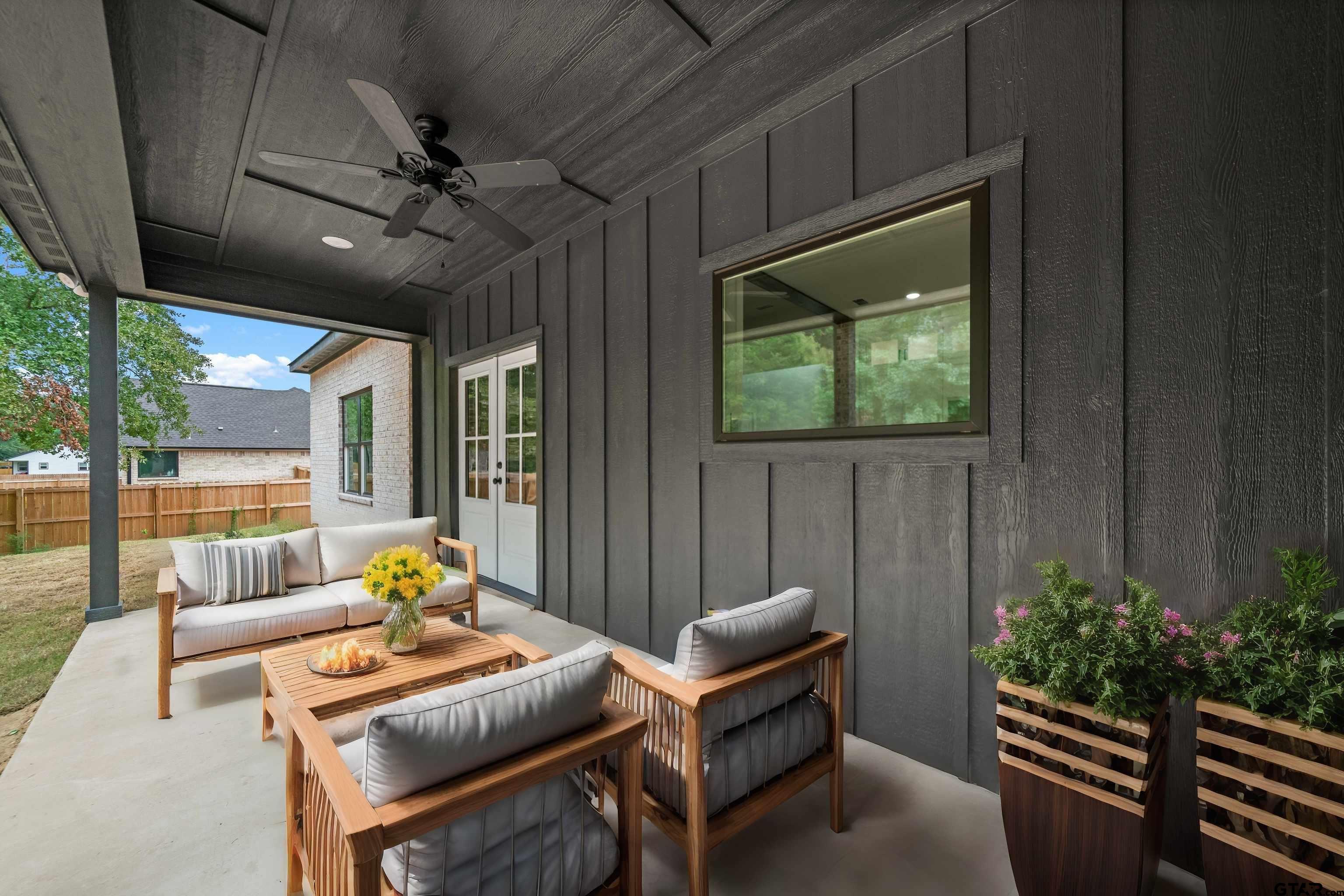 14552 Fallow Lane Tyler, TX 75706 - Photo 9 of 38 a outdoor living space with furniture and garden view