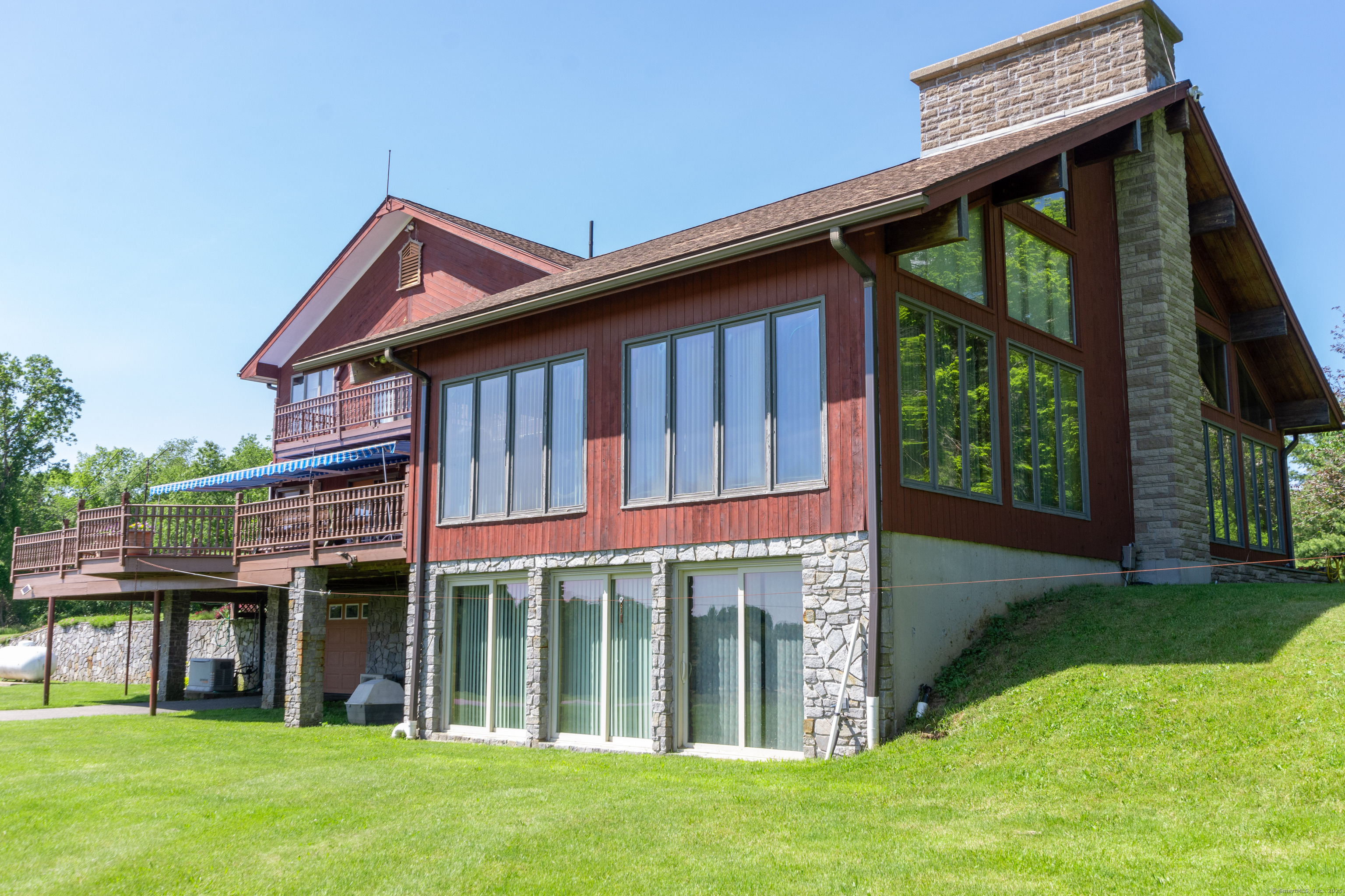 80 Bungay Hill Road Woodstock, CT 06282 - Photo 30 of 39 a view of a house with backyard and porch