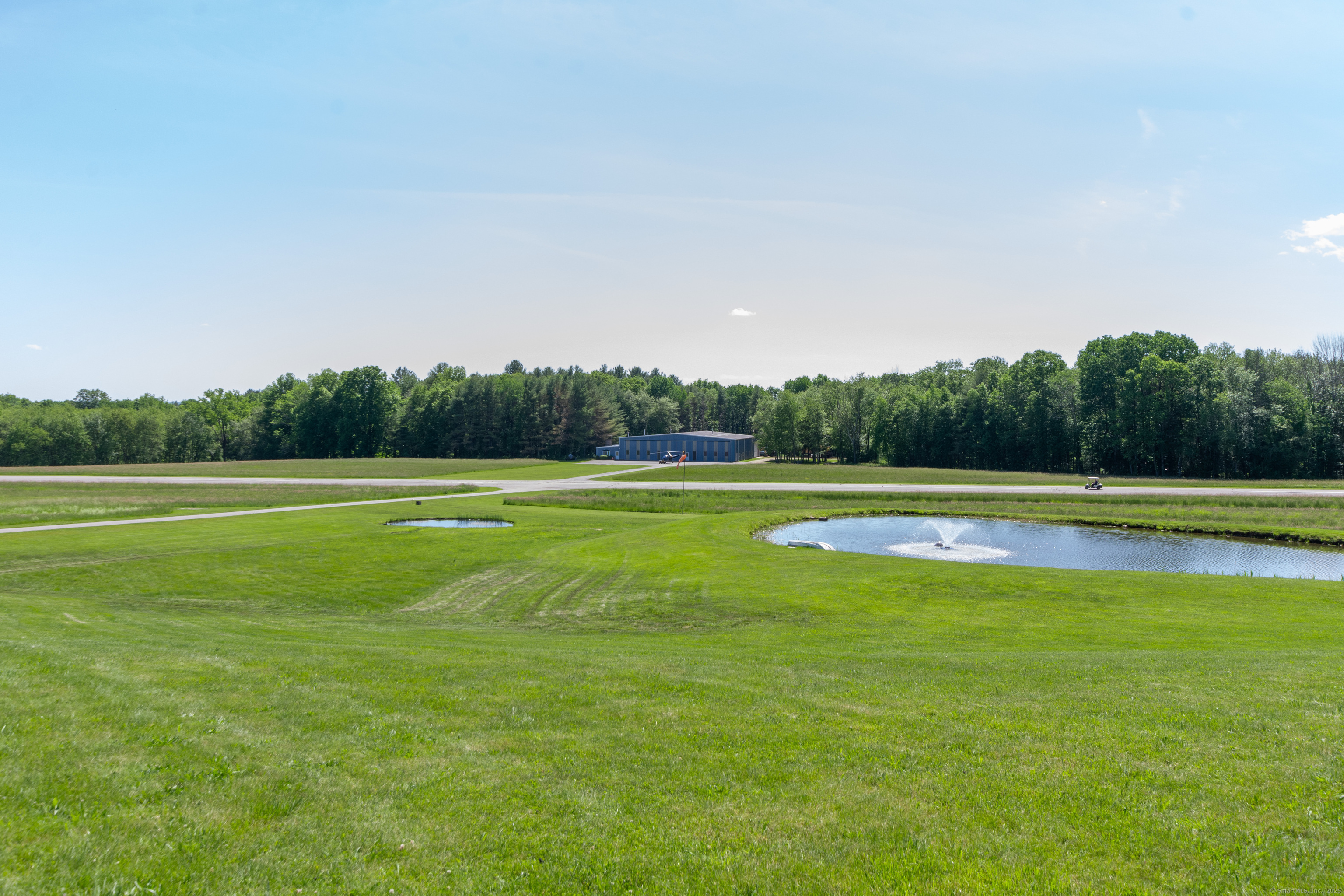 80 Bungay Hill Road Woodstock, CT 06282 - Photo 35 of 39 a view of a swimming pool and a yard