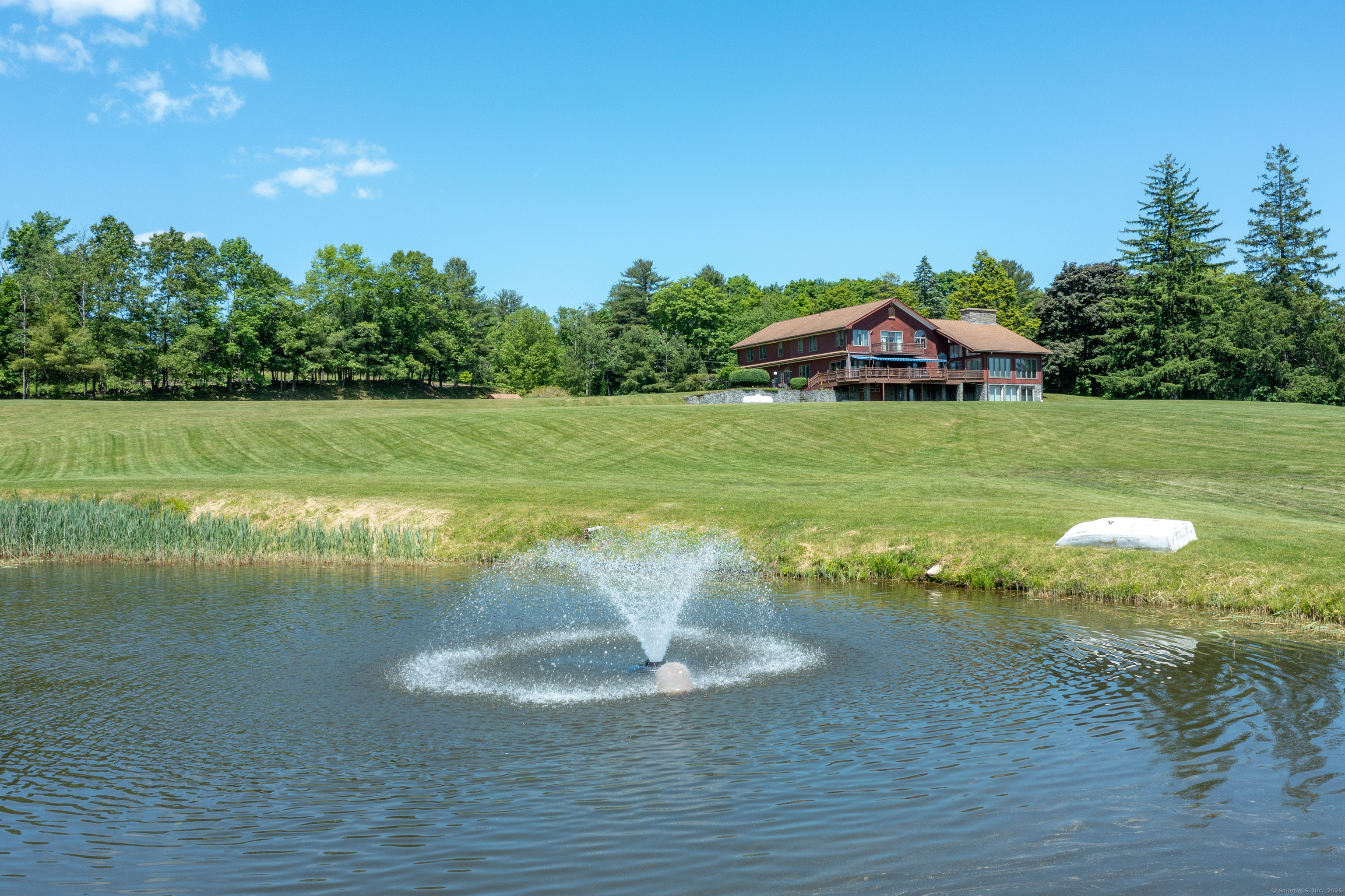 80 Bungay Hill Road Woodstock, CT 06282 - Photo 6 of 39 a view of a lake with a yard