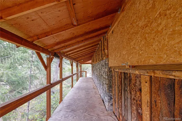 a view of a pathway of a building with a yard