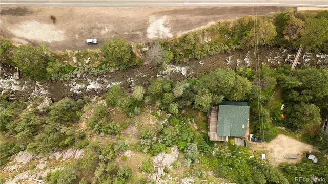 a view of a house with a street