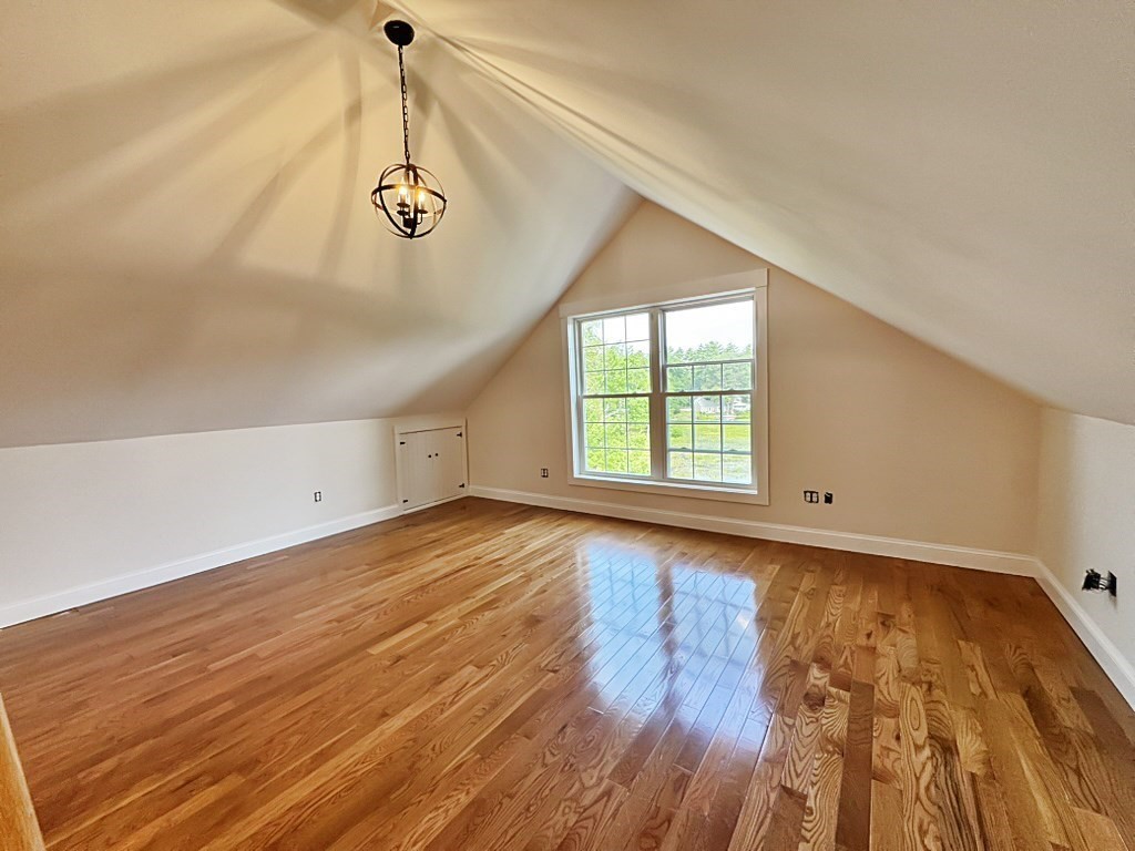8 Dulcies Point Road Kingston, NH 03848 - Photo 23 of 27 a view of a room with wooden floor and windows