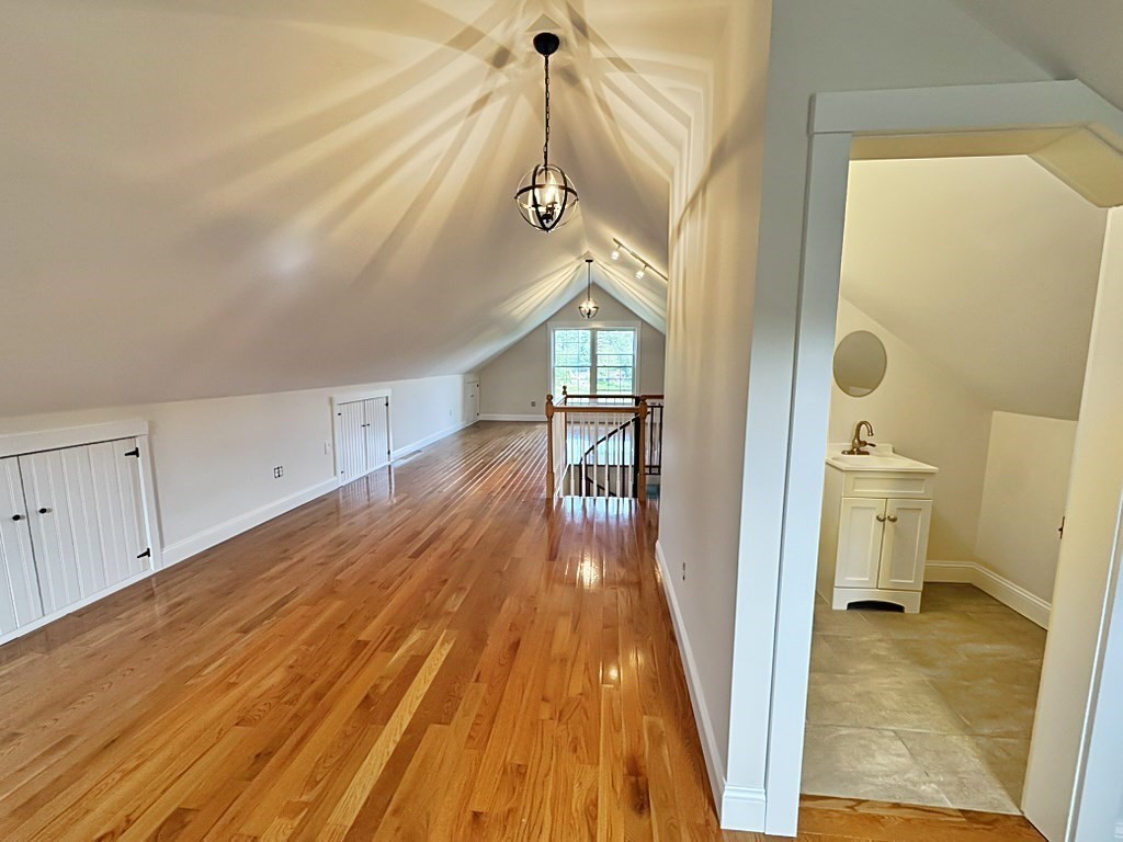 8 Dulcies Point Road Kingston, NH 03848 - Photo 24 of 27 a view of a hallway view with wooden floor and staircase