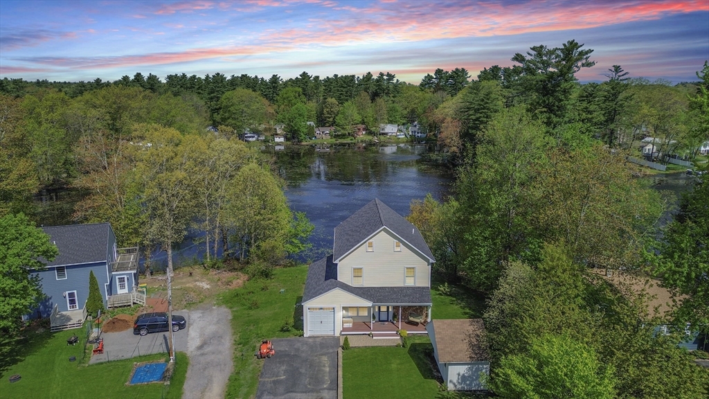 8 Dulcies Point Road Kingston, NH 03848 - Photo 3 of 27 an aerial view of a house with garden space and street view