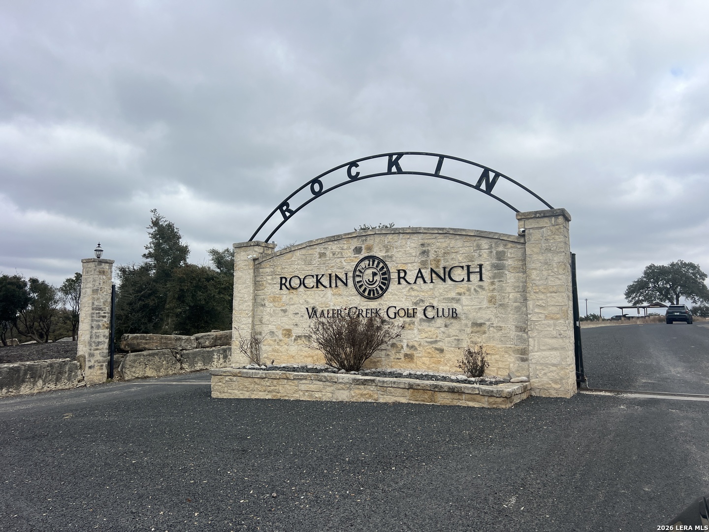 220 Peter Kleid Loop Blanco, TX 78606 - Photo 2 of 5 a sign on the side of a building