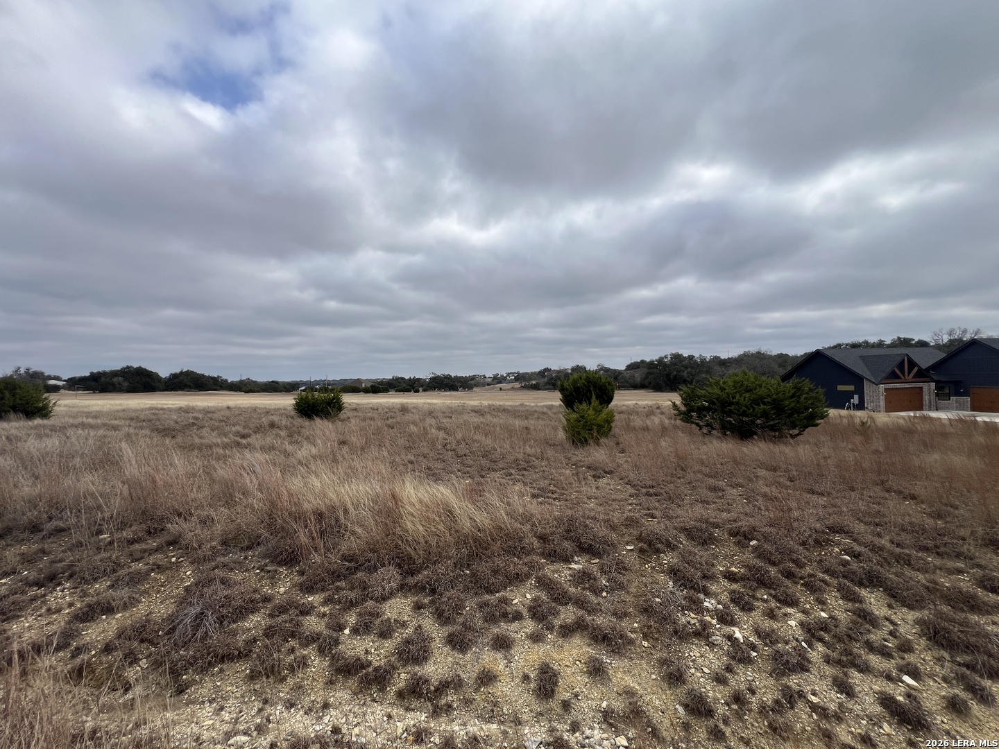 220 Peter Kleid Loop Blanco, TX 78606 - Photo 5 of 5 a view of lake with mountain