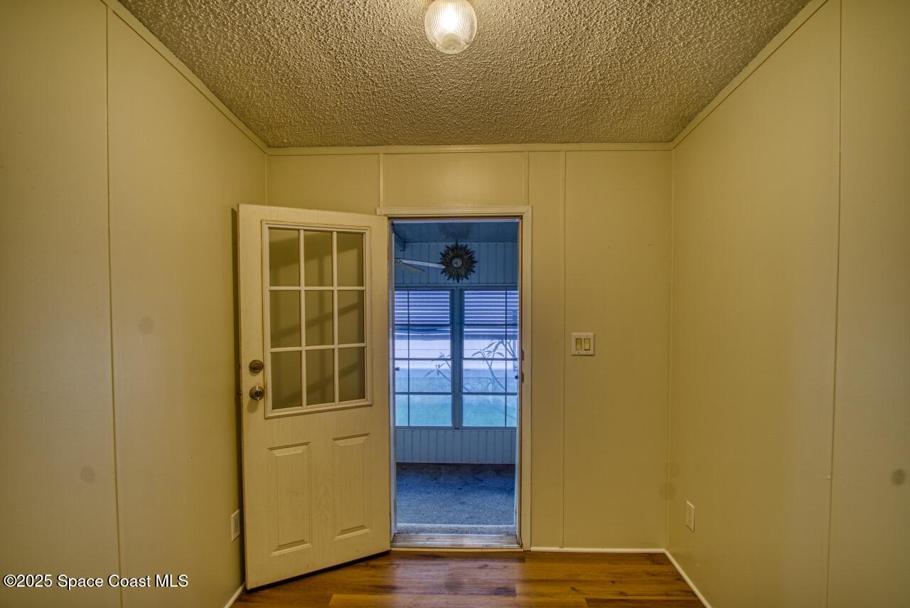 2390 Coconut Palm Drive Palm Bay, FL 32905 - Photo 17 of 27 a view of front door of house