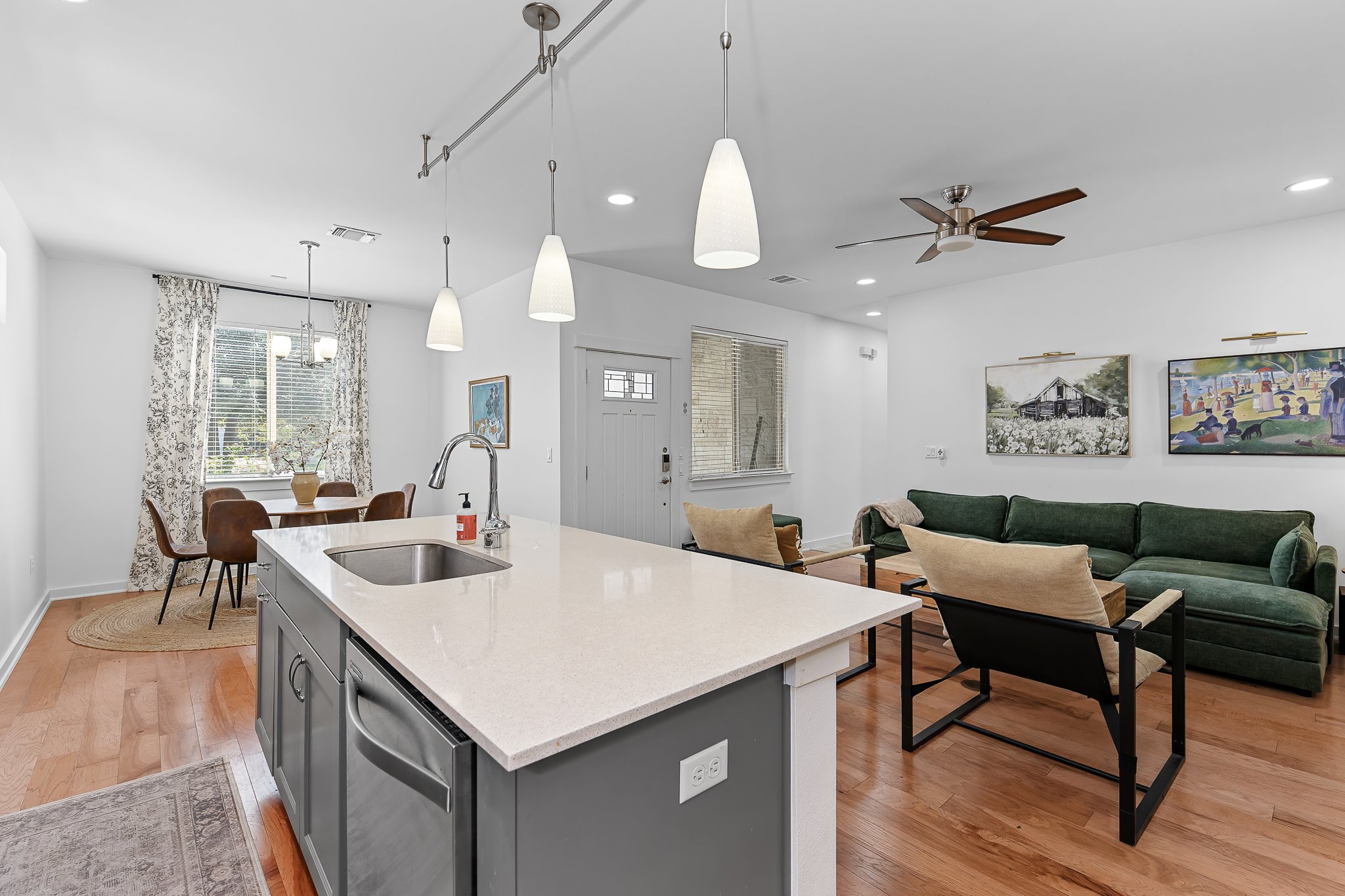 4408 Banister Lane, Unit B Austin, TX 78745 - Photo 13 of 28 a kitchen with a table chairs and wooden floor