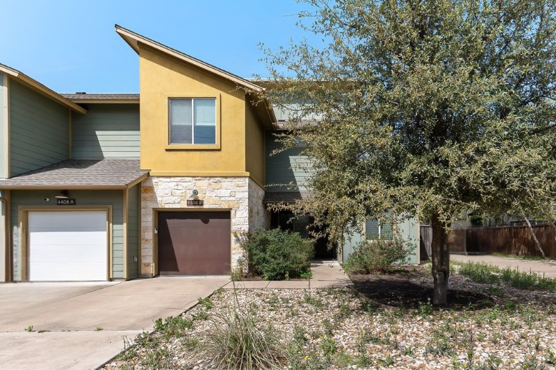 4408 Banister Lane, Unit B Austin, TX 78745 - Photo 2 of 28 a front view of a house with a yard