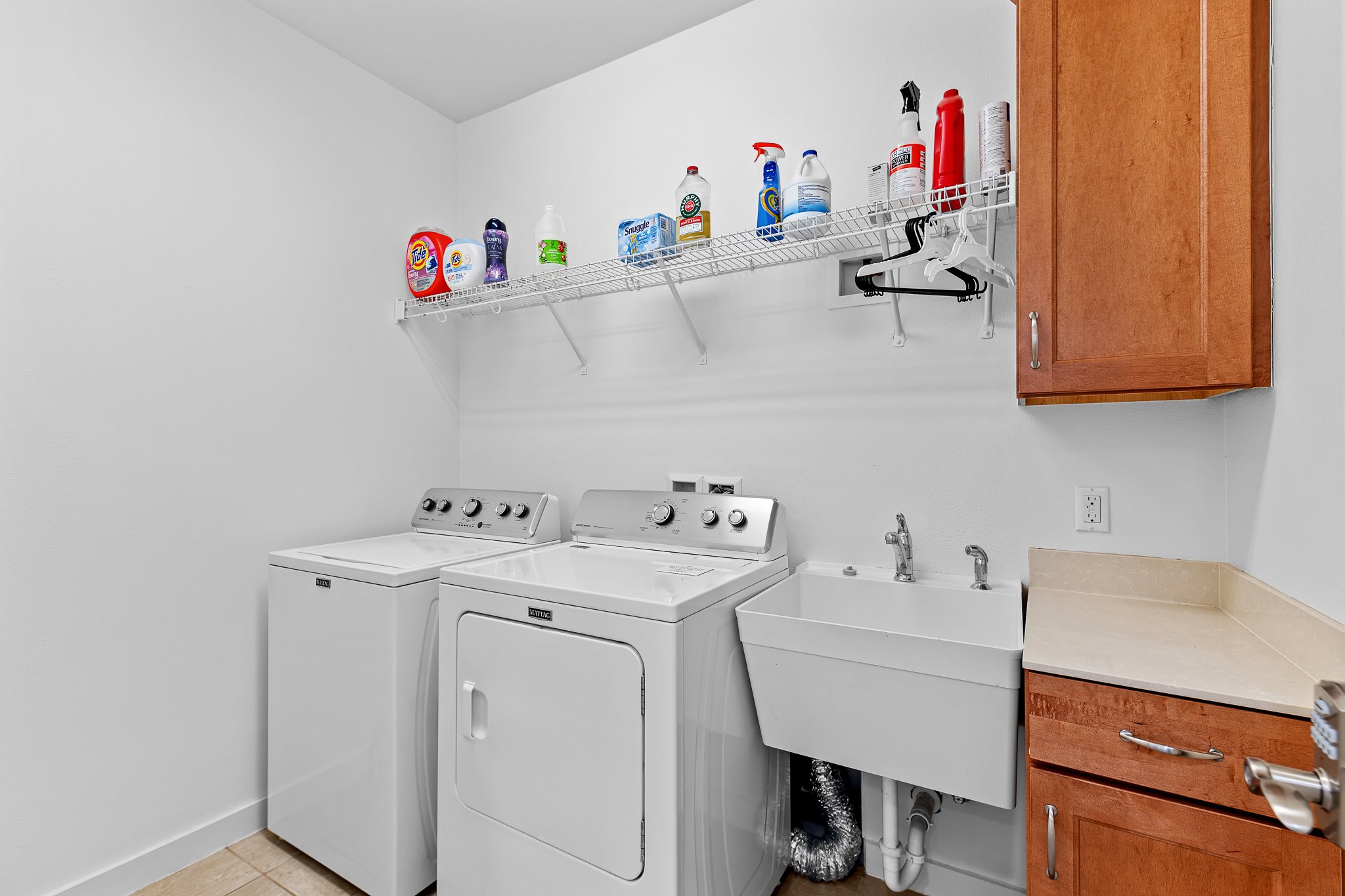 4408 Banister Lane, Unit B Austin, TX 78745 - Photo 24 of 28 a utility room with dryer and washer