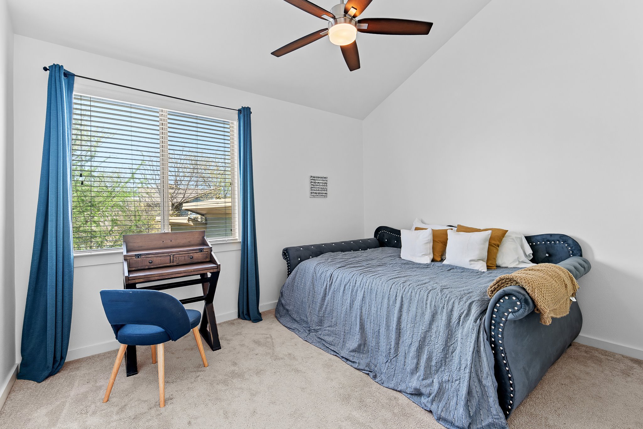 4408 Banister Lane, Unit B Austin, TX 78745 - Photo 26 of 28 a bedroom with a bed and a window