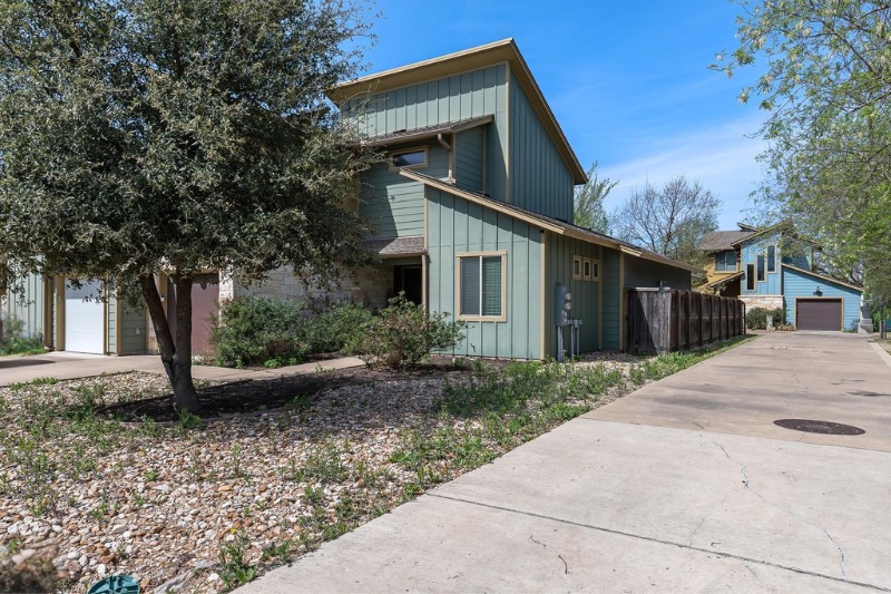 4408 Banister Lane, Unit B Austin, TX 78745 - Photo 4 of 28 a front view of a house with garden
