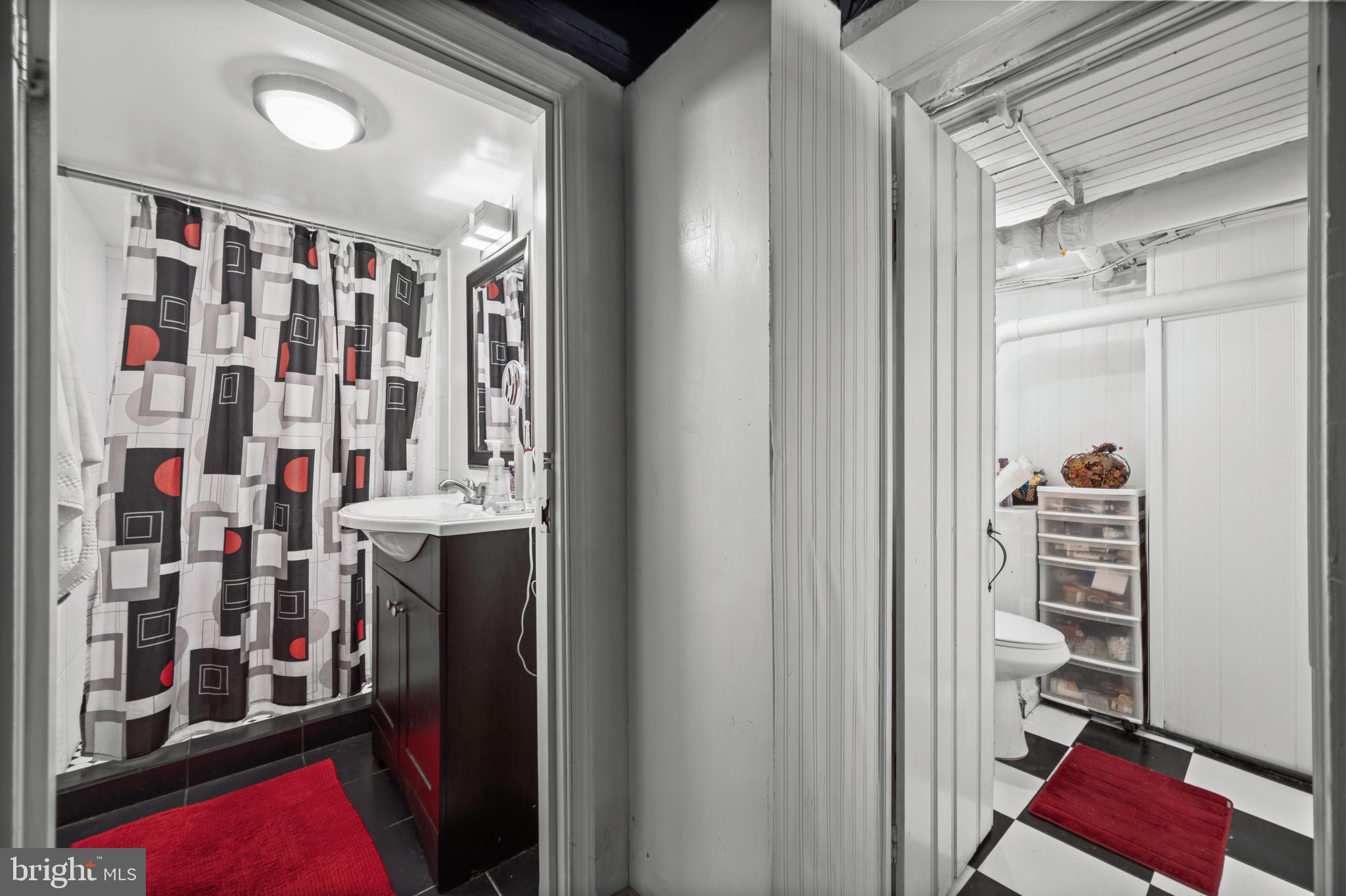 210 South High Street Baltimore, MD 21202 - Photo 43 of 80 a view of walk in closet with clothes and shoes