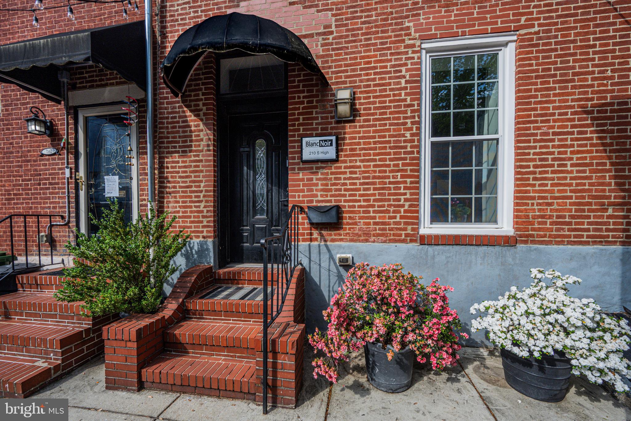 210 South High Street Baltimore, MD 21202 - Photo 5 of 80 a view of a porch with seating space