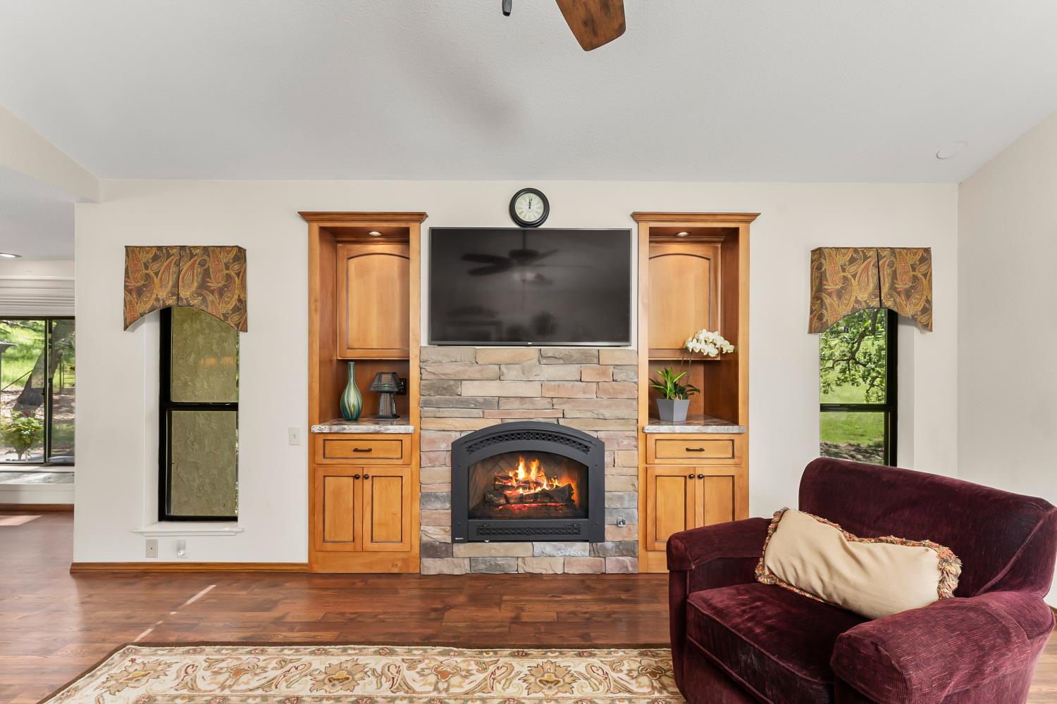 19461 Fiddletown Road Fiddletown, CA 95629 - Photo 17 of 62 a living room with furniture and a fireplace