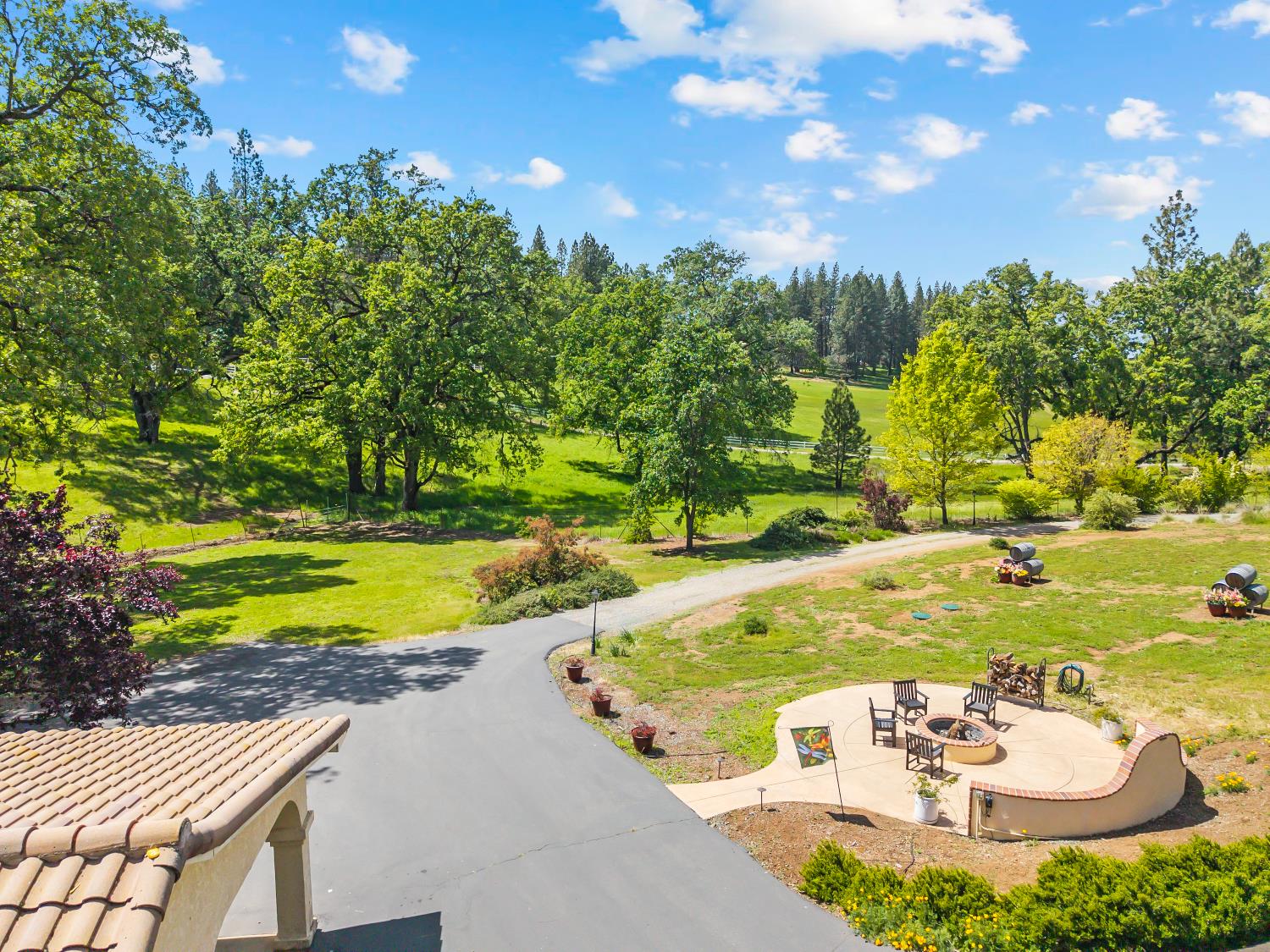19461 Fiddletown Road Fiddletown, CA 95629 - Photo 56 of 62 a view of a white house with a yard