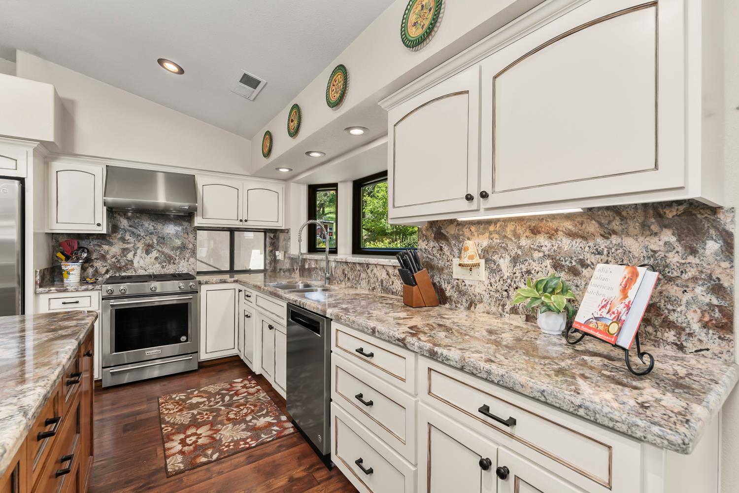 19461 Fiddletown Road Fiddletown, CA 95629 - Photo 10 of 62 a kitchen with granite countertop stainless steel appliances a stove sink and cabinets