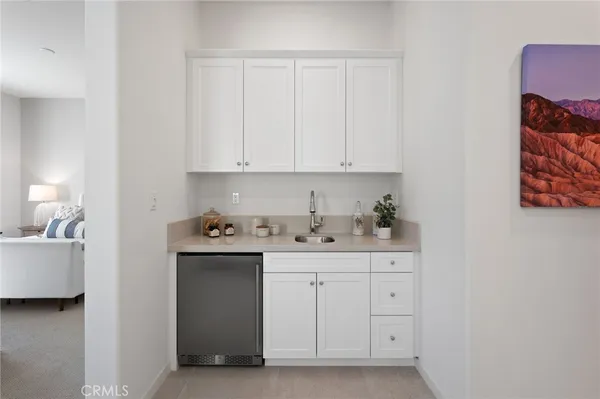 a room with furniture and wooden floor