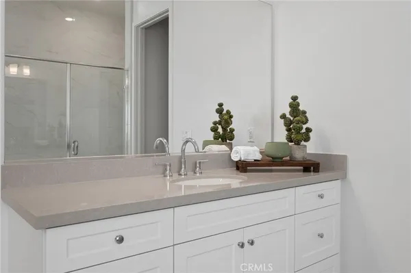 a view of a house with swimming pool and a yard