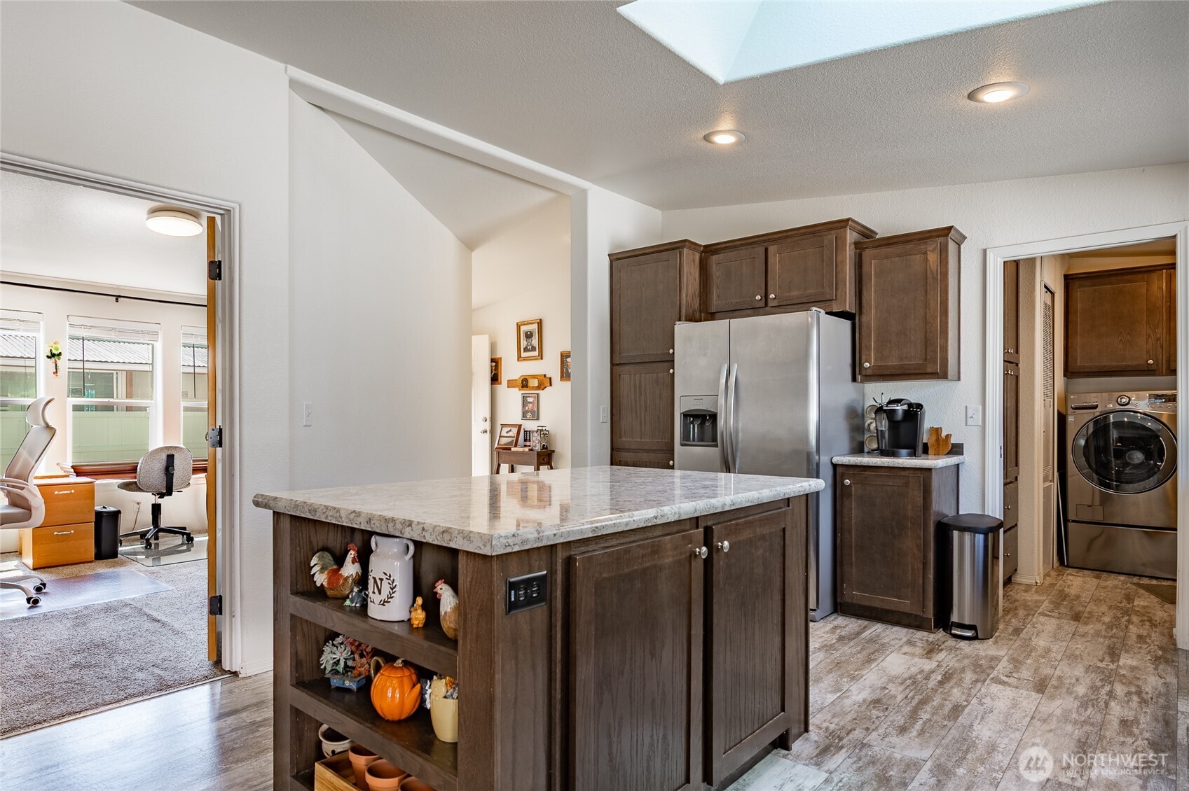 6350 Portal Way, Unit 83 Ferndale, WA 98248 - Photo 12 of 40 a kitchen with stainless steel appliances granite countertop a refrigerator a stove and a refrigerator
