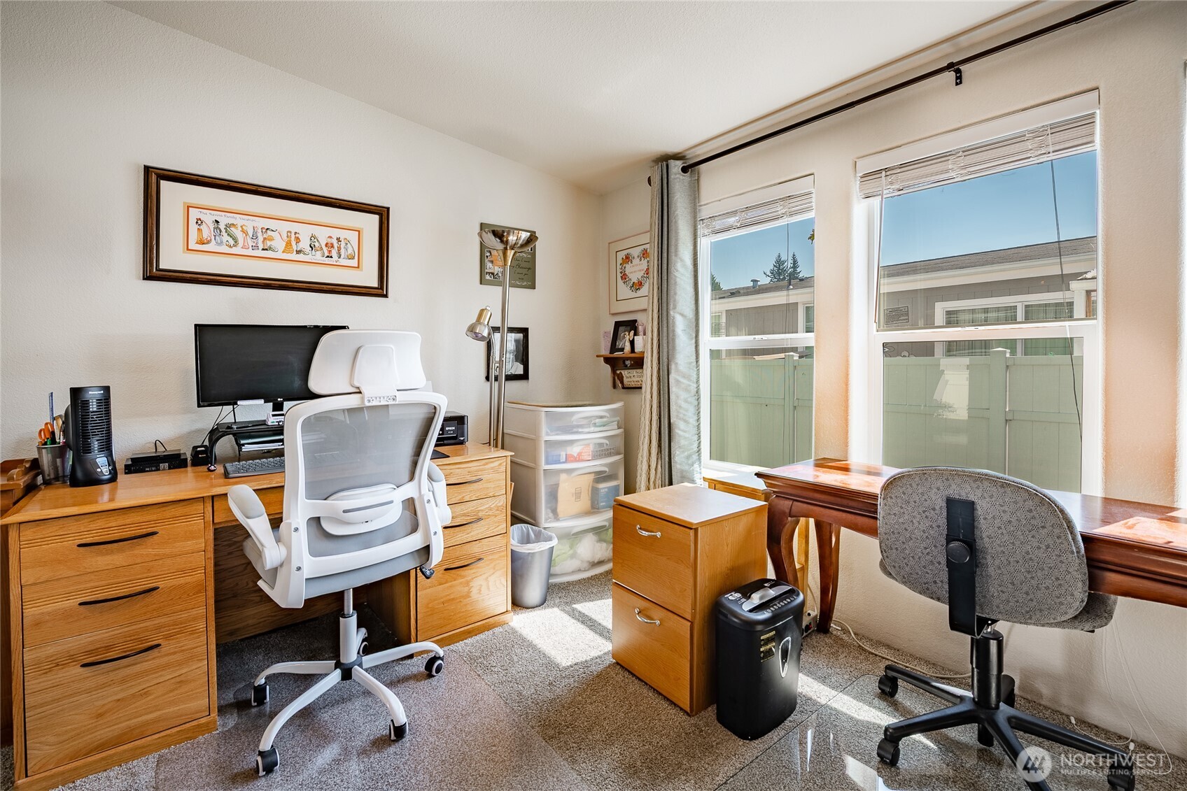 6350 Portal Way, Unit 83 Ferndale, WA 98248 - Photo 16 of 40 a view of a workspace with furniture and a window